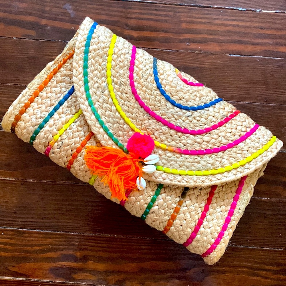 Colorful weaved clutch. New with tags. Medium sized.